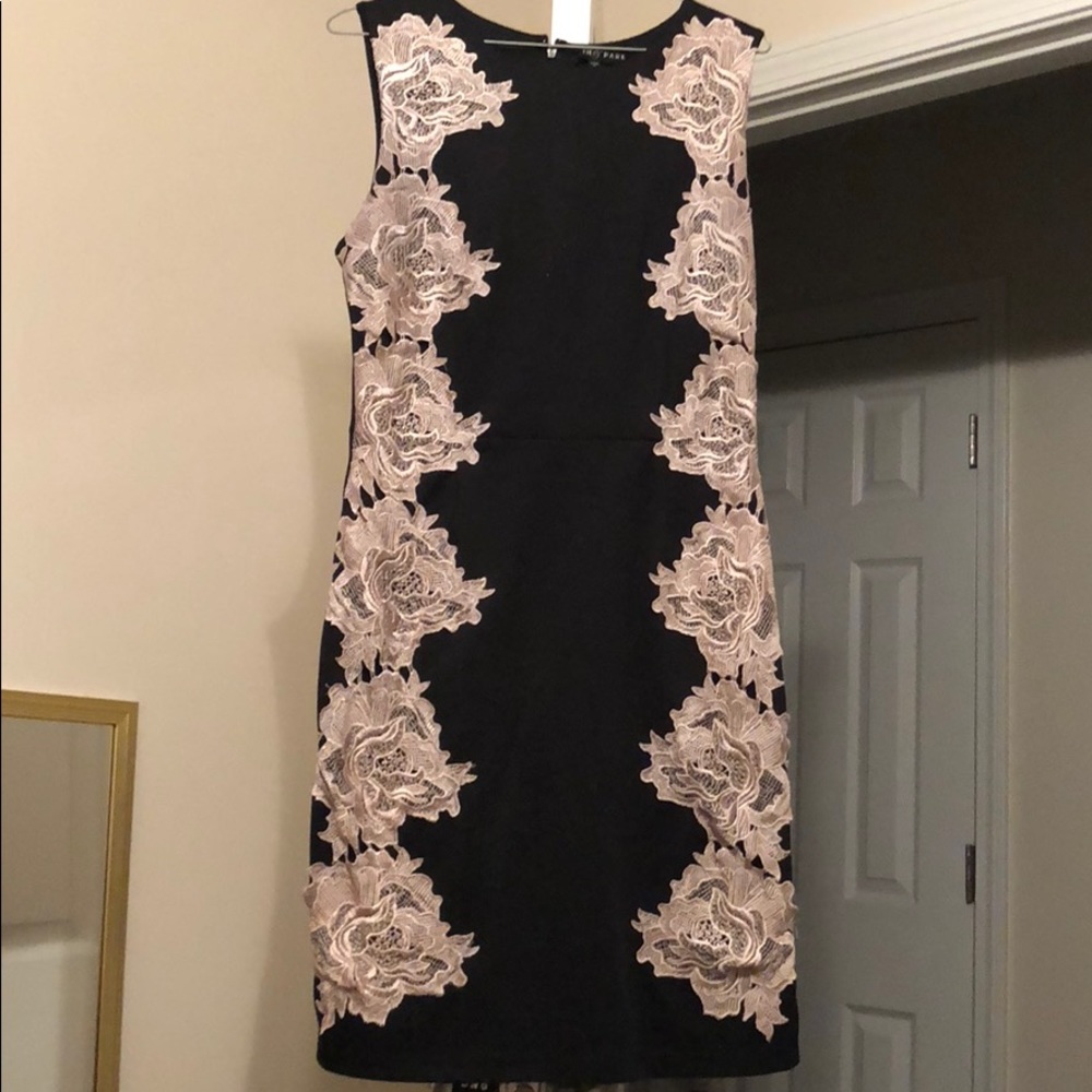 Black dress with light cream roses